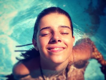 Portrait of smiling young woman