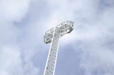 Low angle view of ferris wheel against sky