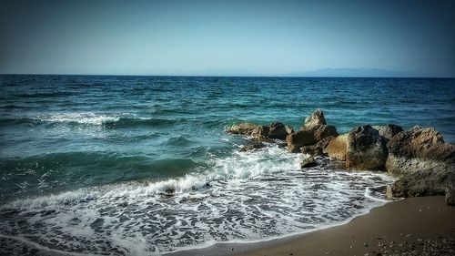 Scenic view of sea against clear sky