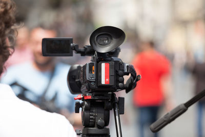 Close-up of video camera during press conference