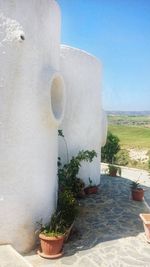 Built structure on landscape against clear sky