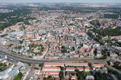 High angle shot of townscape against cityscape