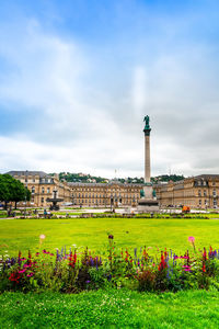 View of buildings against cloudy sky