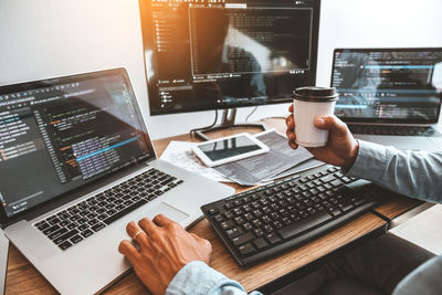 Man using laptop on table