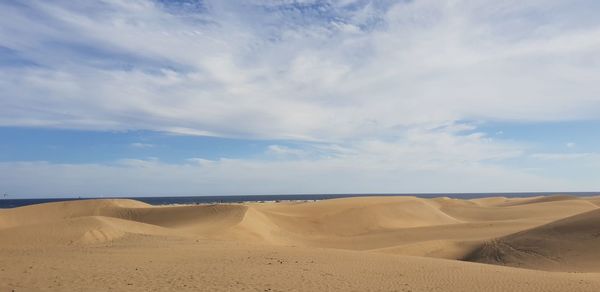 Scenic view of desert against sky