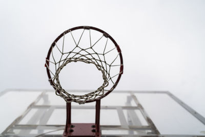 Low angle view of basketball hoop against sky