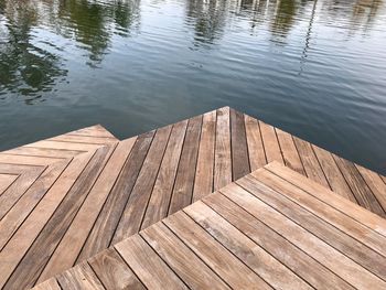 High angle view of wooden pier over lake