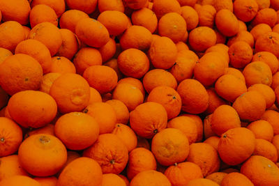 Full frame shot of oranges at market stall