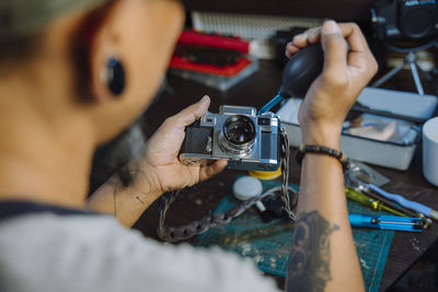 High angle view of man working on table