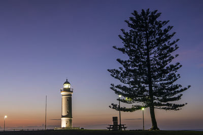 View of tower against sky at night