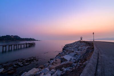 Scenic view of sea against clear sky during sunset