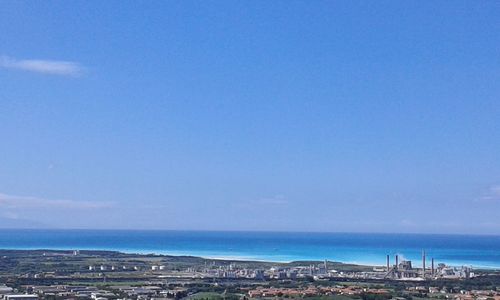 View of cityscape against clear sky