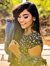 Portrait of smiling young woman