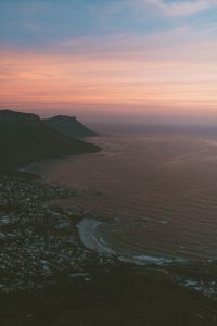 Scenic view of sea at sunset