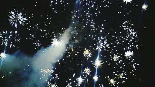 Firework display at night