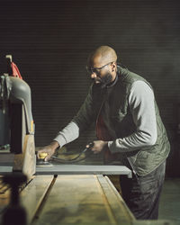 Carpenter working at workshop