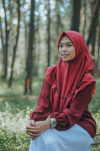 Beautiful young woman in a forest