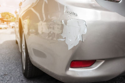 Close-up of car on street