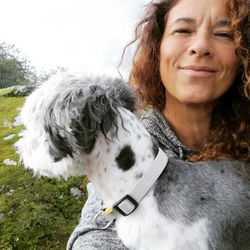 Portrait of woman with dog