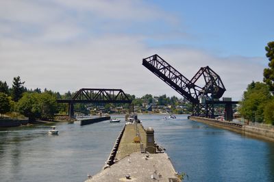 View of bridge over water against sky