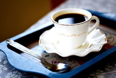 Close-up of coffee cup on table
