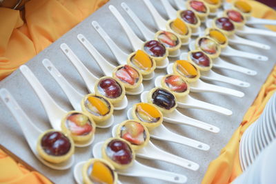 High angle view of dessert arranged on table