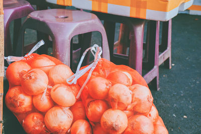 Close-up of orange fruits in market stall