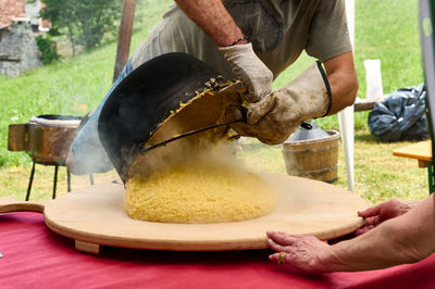 Cropped image of man preparing food