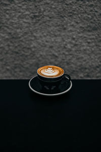 Coffee cup on table