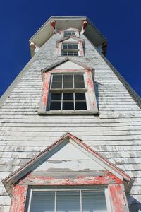 Low angle view of lighthouse against sky