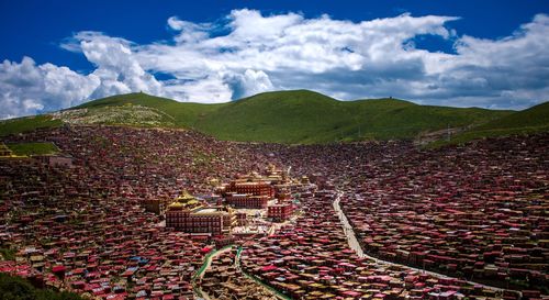 Scenic view of mountains against cloudy sky