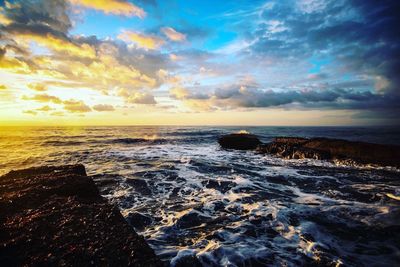 Scenic view of sea against sky during sunset