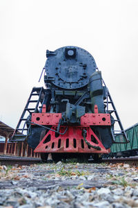 Train on railroad track against sky