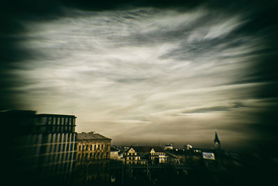 Cityscape against sky during sunset