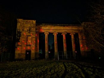 Low angle view of historical building against sky at night