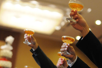 Close-up of hand holding wine glass