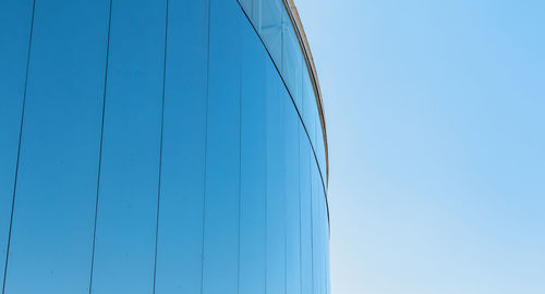 Low angle view of metallic structure against clear blue sky