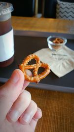 Cropped image of hand holding ice cream