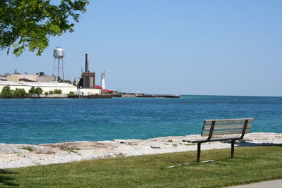 Scenic view of sea against clear blue sky