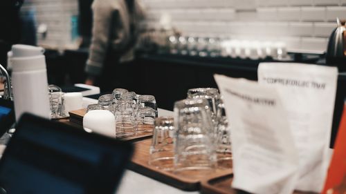 High angle view of drinking glasses on table