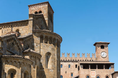 Low angle view of historical building against blue sky