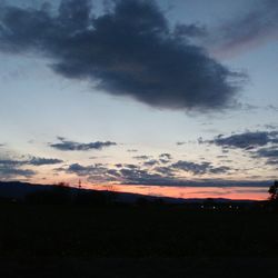 Scenic view of silhouette landscape against sky during sunset