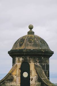 Low angle view of old building against sky