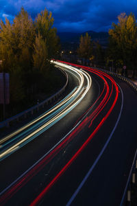 Light trails on road at night