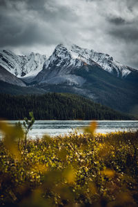 Scenic view of snowcapped mountains against sky