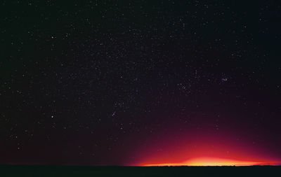 Scenic view of sea against sky at night