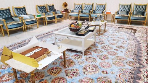 High angle view of chairs on table at home