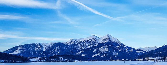 Scenic view of snowcapped mountains against sky