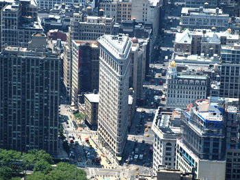 High angle view of street amidst buildings in city