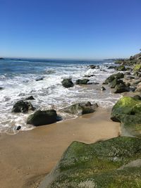 Scenic view of sea against clear sky